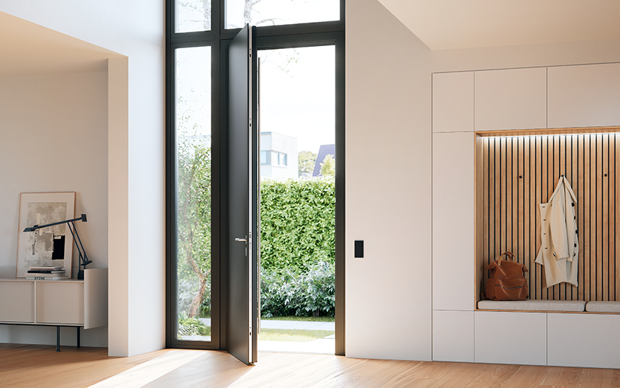 "Moderner Eingangsbereich mit hoher, geöffneter Glastür, viel Tageslicht und integrierter Garderobe."